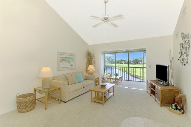 carpeted living room featuring high vaulted ceiling and ceiling fan