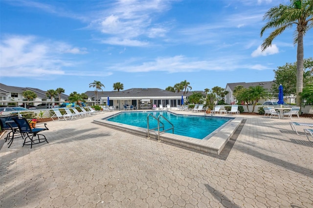 view of pool featuring a patio area