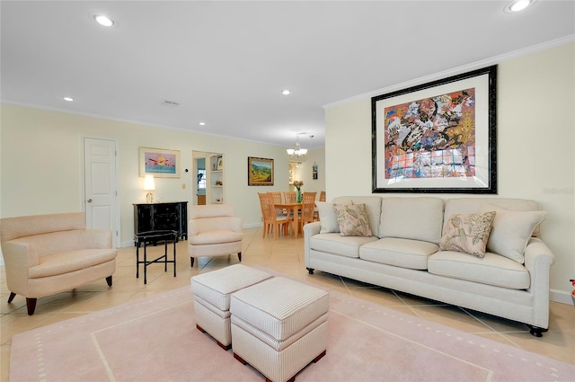 living room with a notable chandelier, recessed lighting, baseboards, ornamental molding, and tile patterned floors