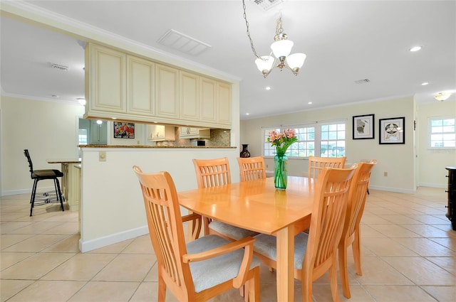 dining room with light tile patterned floors, visible vents, an inviting chandelier, crown molding, and recessed lighting