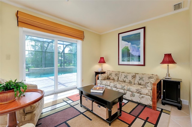 living room featuring light tile patterned floors, visible vents, and crown molding