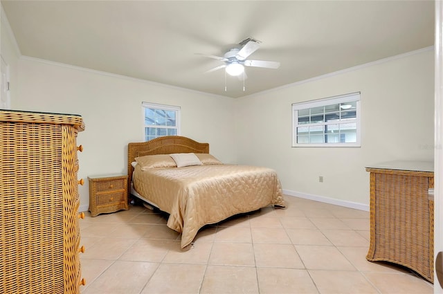 bedroom featuring multiple windows, crown molding, baseboards, and light tile patterned floors