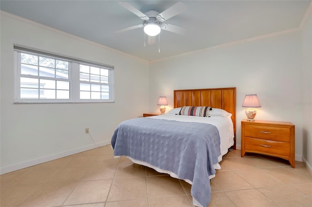 bedroom with light tile patterned flooring, crown molding, and baseboards