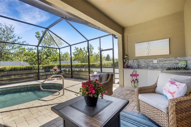 view of pool with a fenced in pool, an outdoor hangout area, glass enclosure, a patio area, and fence