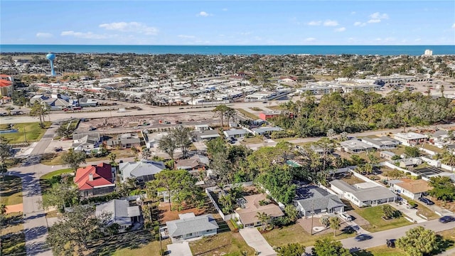 bird's eye view featuring a residential view and a water view