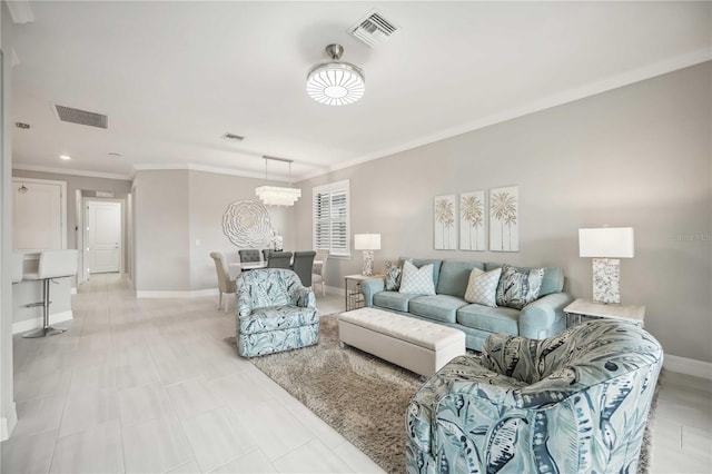13867 Vadini St, Venice, FL 34293 - living area with baseboards, ornamental molding, visible vents, and recessed lighting