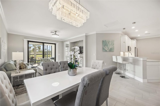 13867 Vadini St, Venice, FL 34293 - dining area with ornamental molding and recessed lighting