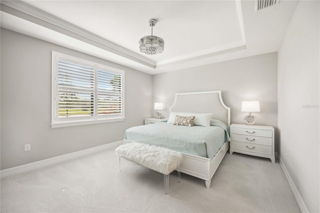 13867 Vadini St, Venice, FL 34293 - bedroom featuring visible vents, baseboards, a raised ceiling, and carpet flooring