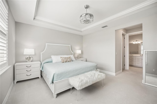13867 Vadini St, Venice, FL 34293 - bedroom featuring a tray ceiling, visible vents, light colored carpet, and baseboards