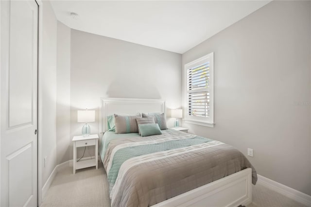 13867 Vadini St, Venice, FL 34293 - bedroom featuring baseboards and light carpet