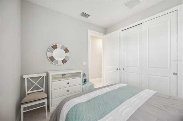13867 Vadini St, Venice, FL 34293 - bedroom featuring a closet, baseboards, and visible vents