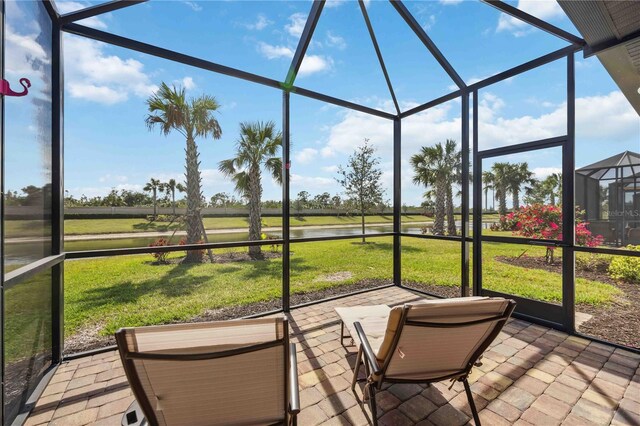 13867 Vadini St, Venice, FL 34293 - sunroom with a water view