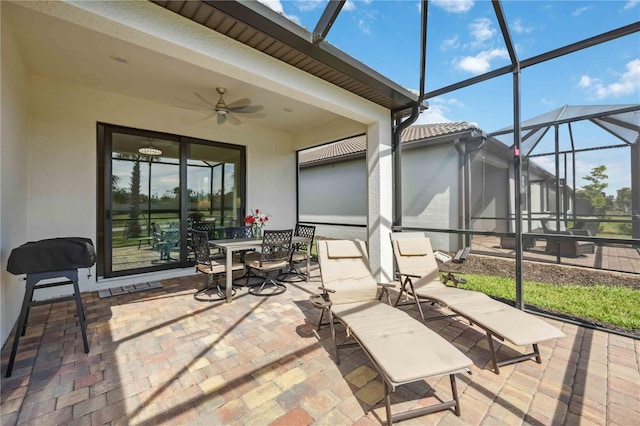13867 Vadini St, Venice, FL 34293 - sunroom / solarium with outdoor dining space and a ceiling fan