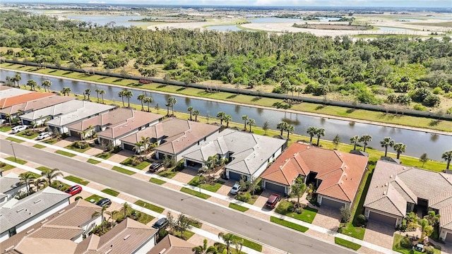13867 Vadini St, Venice, FL 34293 - birds eye view of property featuring a water view and a residential view