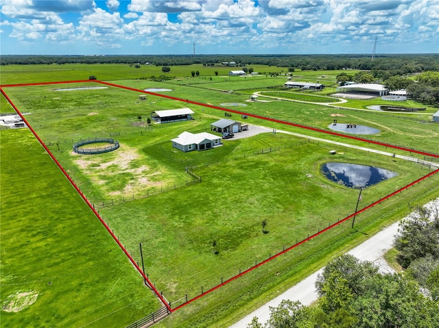 aerial view featuring a rural view and a water view