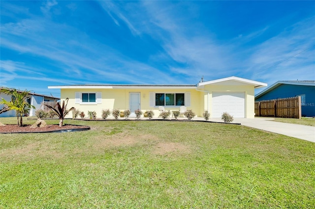 ranch-style home featuring driveway, a garage, fence, a front lawn, and stucco siding