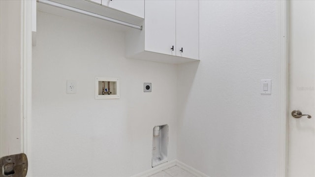 laundry room featuring hookup for a washing machine, hookup for an electric dryer, cabinet space, and baseboards