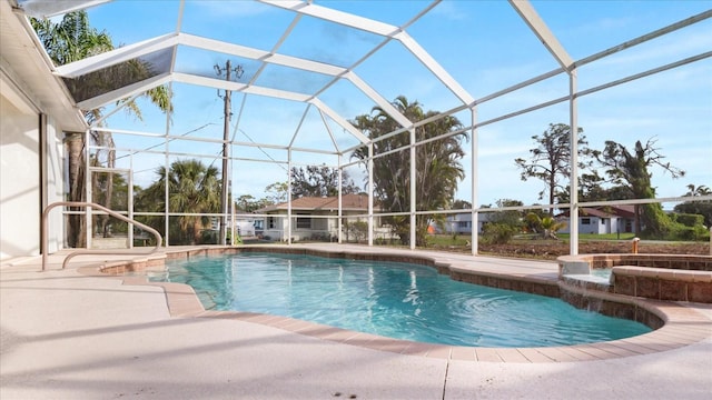 outdoor pool featuring a patio and a lanai