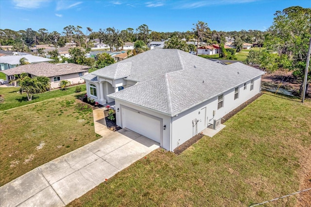 birds eye view of property with a residential view