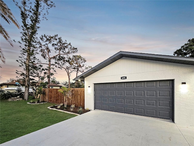 garage with fence