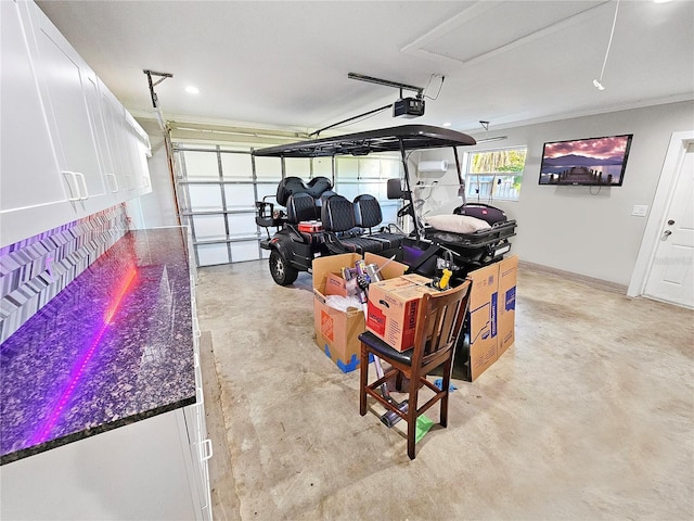 garage featuring a garage door opener