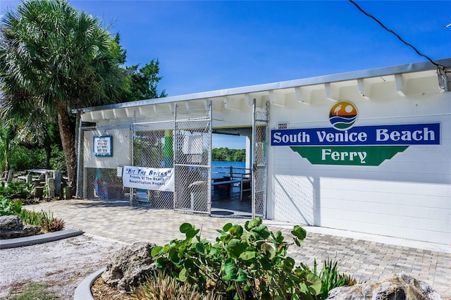 view of building exterior with a water view