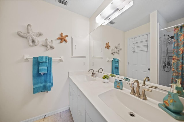 full bath featuring tile patterned flooring, visible vents, a sink, and double vanity