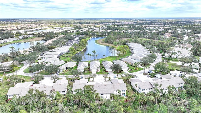 birds eye view of property featuring a residential view and a water view