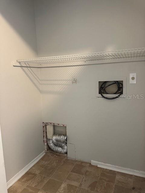 laundry room featuring laundry area, hookup for a washing machine, baseboards, and electric dryer hookup