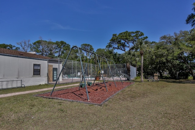 community playground with fence and a yard