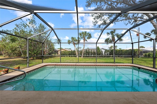 pool featuring a lawn and a lanai