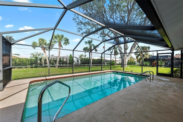 outdoor pool featuring a lanai, a patio area, and a yard