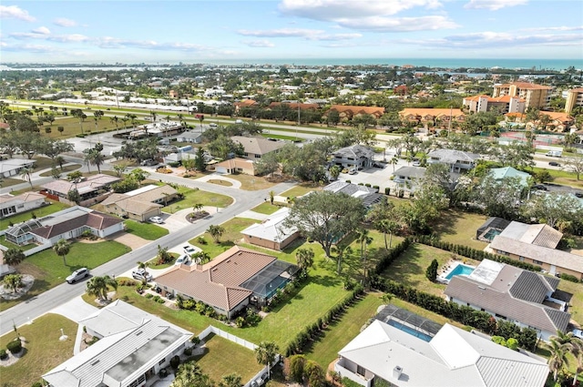 birds eye view of property with a residential view