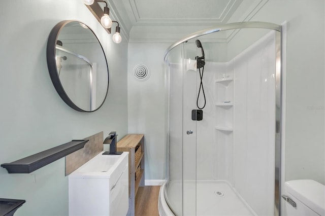 full bathroom with a stall shower, visible vents, toilet, and wood finished floors