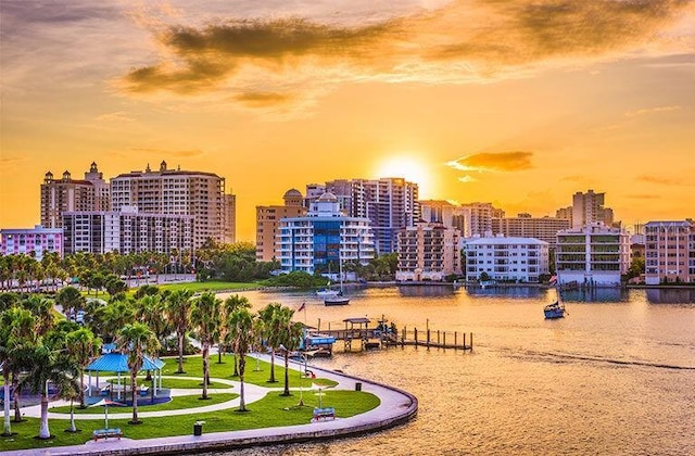 view of home's community featuring a city view, a water view, and a gazebo