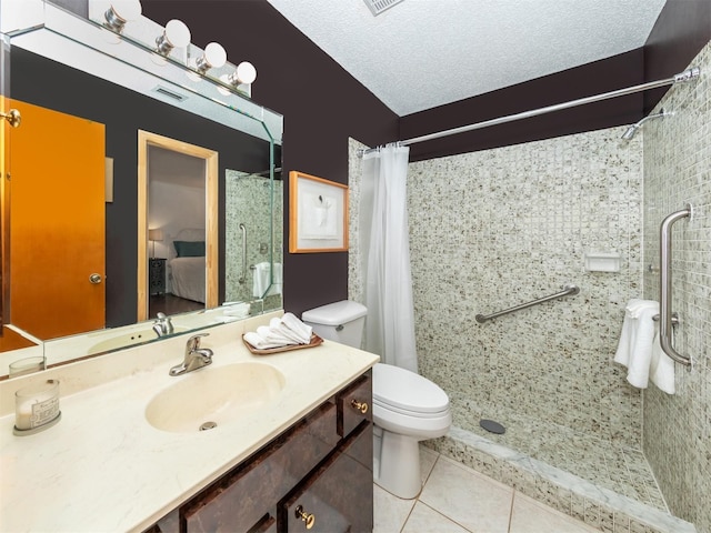 full bath with toilet, connected bathroom, vanity, a textured ceiling, and tile patterned floors