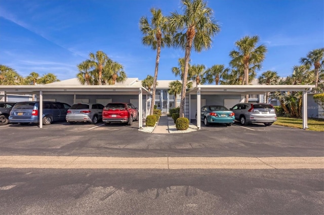 view of front of home featuring covered parking