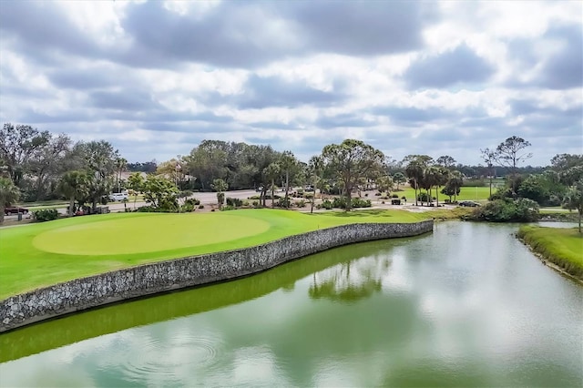 view of community with a water view and golf course view