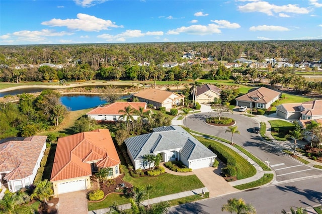 aerial view featuring a water view and a residential view