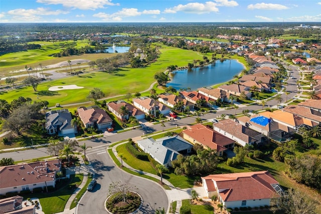 birds eye view of property featuring a residential view, a water view, and golf course view