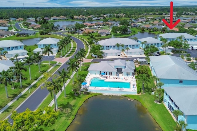 bird's eye view featuring a water view and a residential view