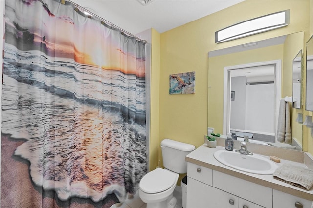 bathroom featuring a shower with shower curtain, vanity, and toilet