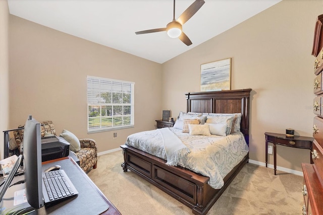 bedroom featuring a ceiling fan, lofted ceiling, light colored carpet, and baseboards