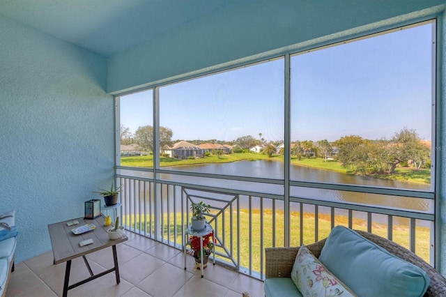 sunroom with a water view