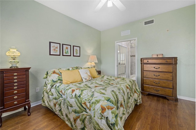 bedroom featuring dark wood-style flooring, visible vents, and baseboards