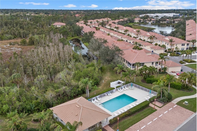 aerial view featuring a water view and a residential view