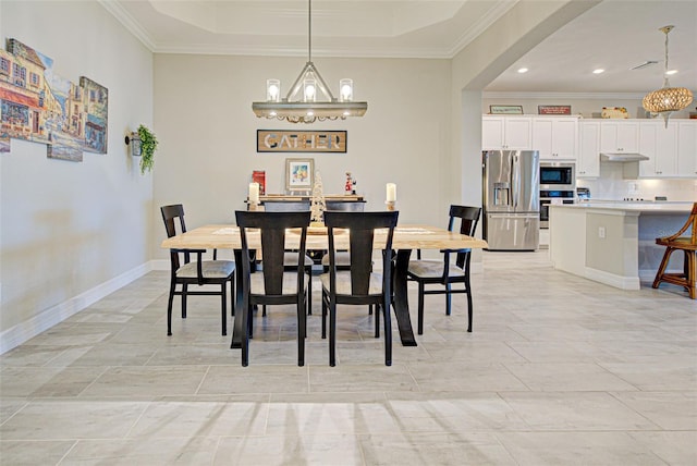 dining area with baseboards, arched walkways, ornamental molding, a chandelier, and recessed lighting