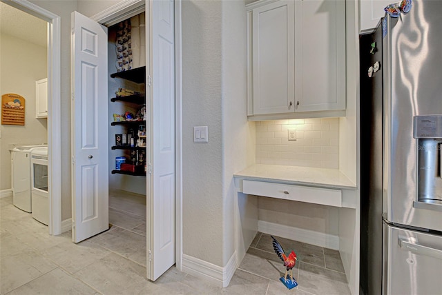 pantry featuring independent washer and dryer