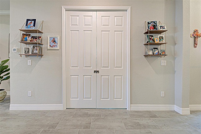 interior space with baseboards