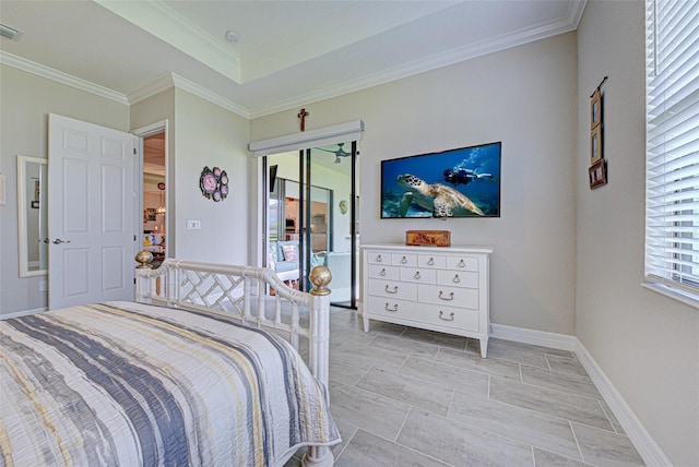 bedroom featuring visible vents, baseboards, ornamental molding, a closet, and a tray ceiling